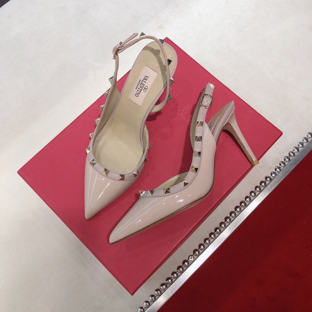 Va1e*ntin0 Garavani Rockstud Patent Leather Strap Pump Beige