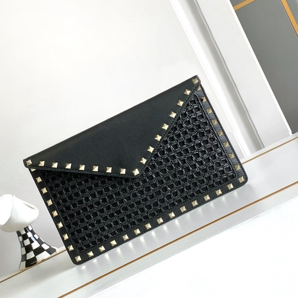 Va1e*ntin0 Garavani Rockstud Raffia Clutch Bag In Black 28Cm