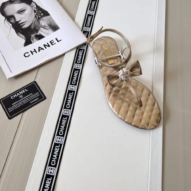 Ch**el Gold Quilted Leather With White Camellia Cc Logo Bow Thong Sandals
