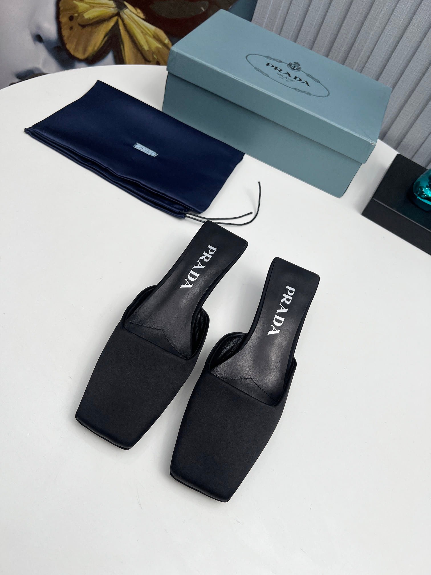 Pra*a Leather Mules Black