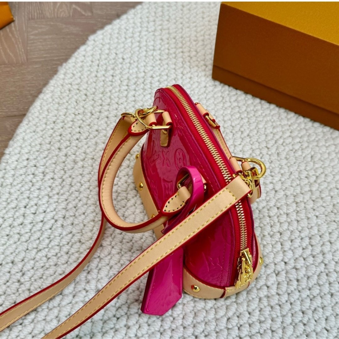 L0vis Vvtt0n Alma Nano Monogram Vernis Embossed Neon Pink 18Cm M90611